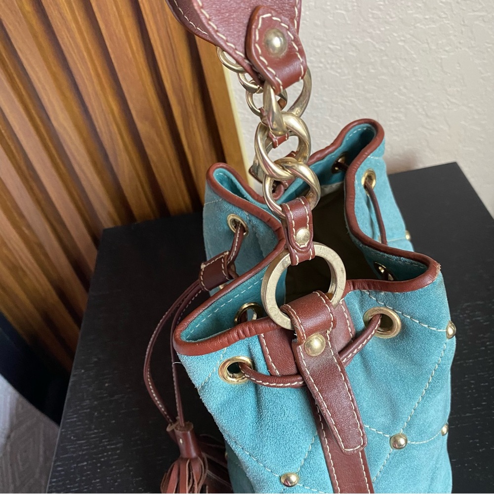Claudia Firenze Quilted Drawstring
Nubuck Leather Handbag Studded
Bucket Bag - Picture 13 of 16